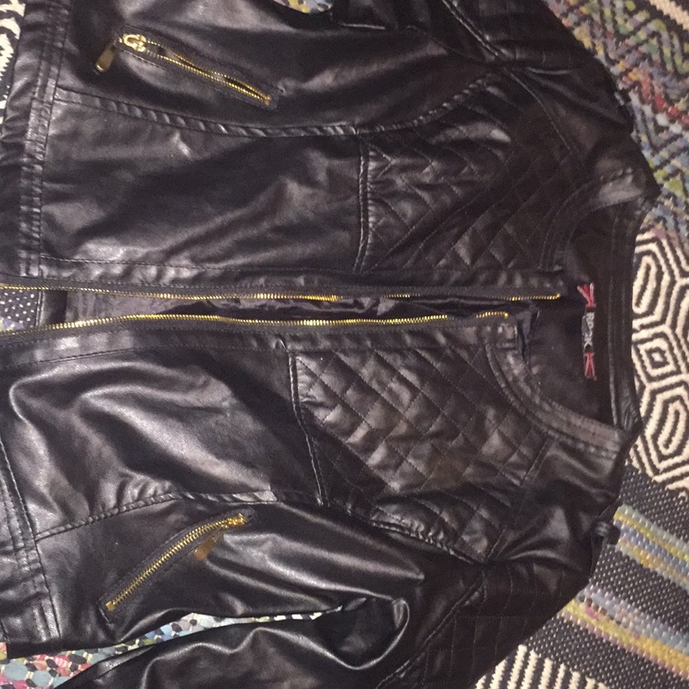 Leather punk jacket. Gold zipper